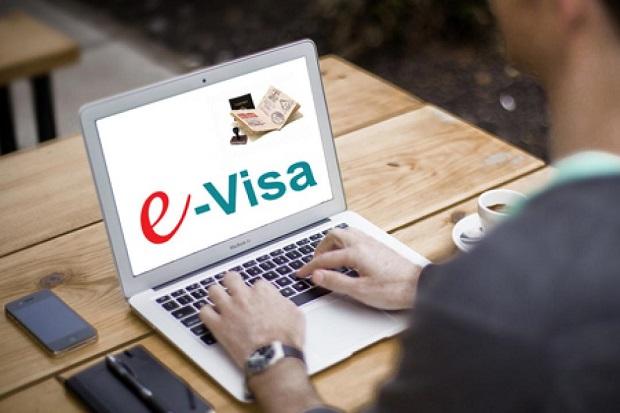 Gỡ vướng về cấp visa điện tử, chứng nhận tạm trú - Ảnh 1.